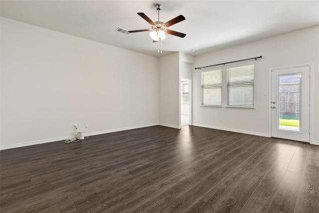855 Revere Ct, Fate, TX 75189 - unfurnished room featuring dark wood-style floors, ceiling fan, and baseboards