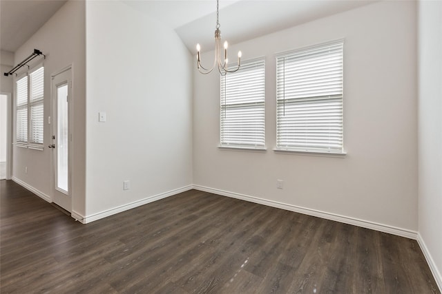 855 Revere Ct, Fate, TX 75189 - spare room featuring a chandelier, dark wood finished floors, baseboards, and lofted ceiling
