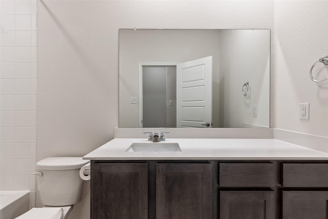 855 Revere Ct, Fate, TX 75189 - bathroom with toilet, vanity, and shower / washtub combination