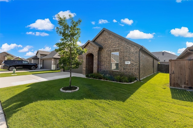 855 Revere Ct, Fate, TX 75189 - view of front of home with brick siding, concrete driveway, and a garage