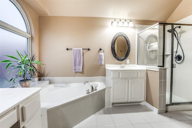 2318 Sparrow Dr, Forney, TX 75126 - bathroom featuring tile patterned flooring, vanity, a garden tub, and a shower stall