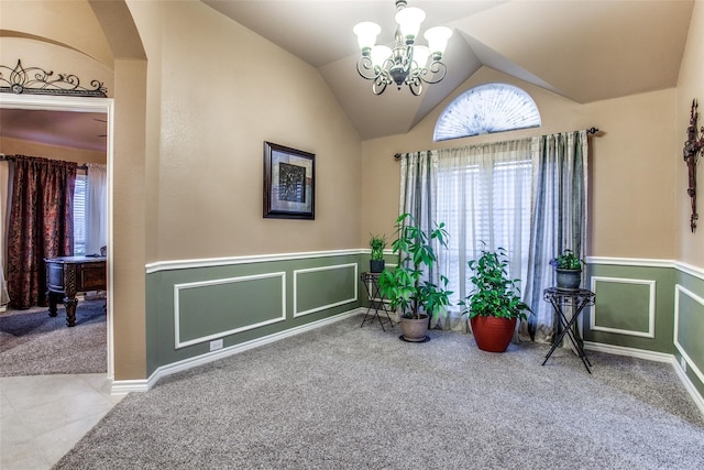 2318 Sparrow Dr, Forney, TX 75126 - entrance foyer featuring carpet, healthy amount of natural light, a chandelier, wainscoting, and lofted ceiling