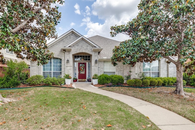 3832 Creekside Ln, Carrollton, TX 75010 - view of front of property featuring roof with shingles and brick siding