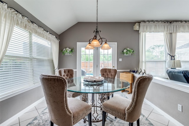 3832 Creekside Ln, Carrollton, TX 75010 - dining space featuring tile patterned flooring, baseboards, and lofted ceiling