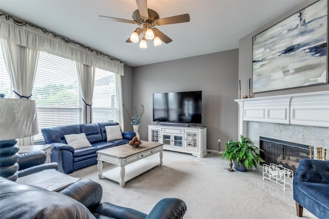 3832 Creekside Ln, Carrollton, TX 75010 - living room featuring a ceiling fan, light carpet, a high end fireplace, and baseboards
