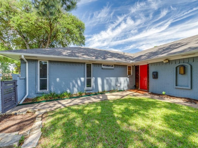 4857 Fallon Pl, Dallas, TX 75227 - single story home with brick siding, a front yard, and roof with shingles