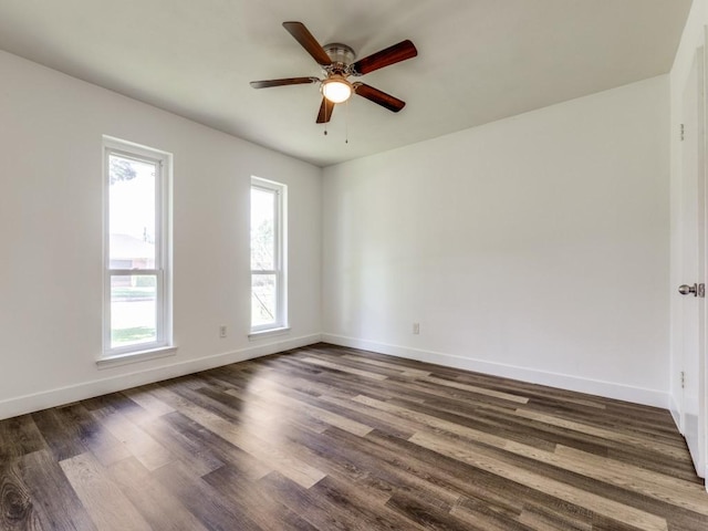 4857 Fallon Pl, Dallas, TX 75227 - unfurnished room featuring ceiling fan, baseboards, and dark wood-style floors