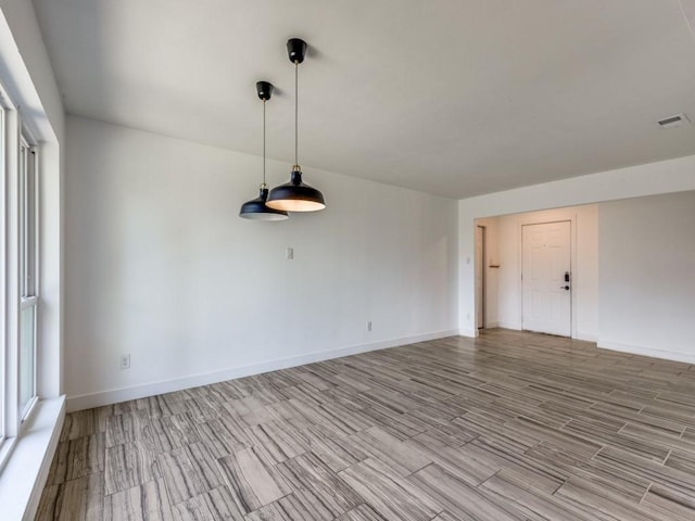 4857 Fallon Pl, Dallas, TX 75227 - empty room with wood finished floors and baseboards
