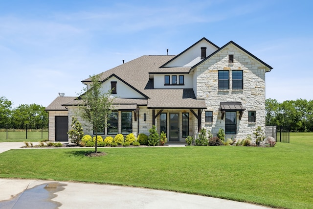 4106 Tamarack Ln, Royse City, TX 75189 - view of front of home with stone siding, a front yard, a shingled roof, an attached garage, and concrete driveway