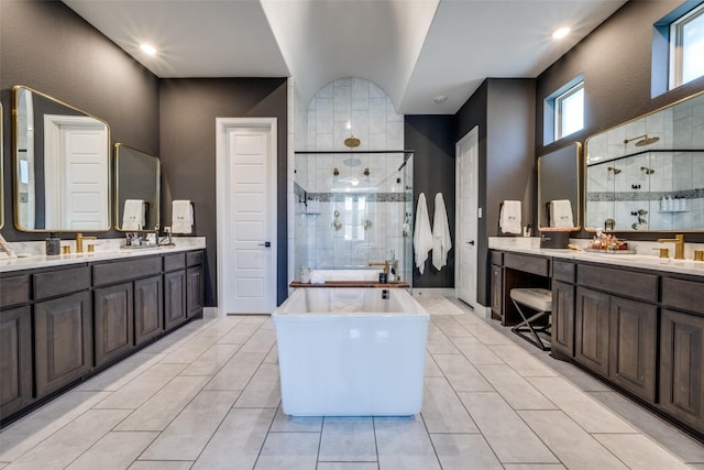 433 Silver Chase Dr, Keller, TX 76248 - bathroom with two vanities, a soaking tub, and a shower stall
