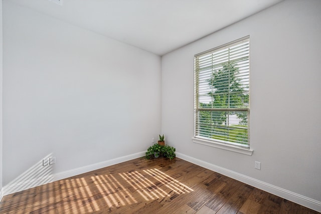 5901 Kildare Ct, Mckinney, TX 75071 - empty room featuring baseboards and wood finished floors