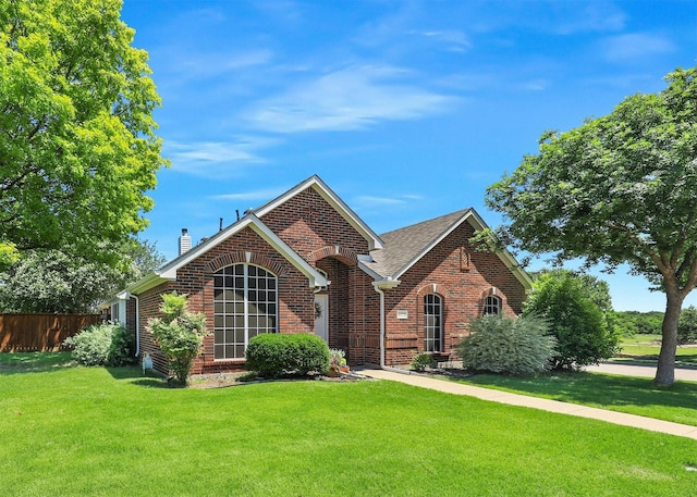 6023 Vista Ln, Sachse, TX 75048 - view of front of home with brick siding and a chimney