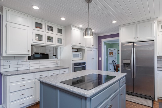 1147 Vz County Road 3417, Wills Point, TX 75169 - kitchen with stainless steel appliances, white cabinetry, recessed lighting, a kitchen island, and hanging light fixtures