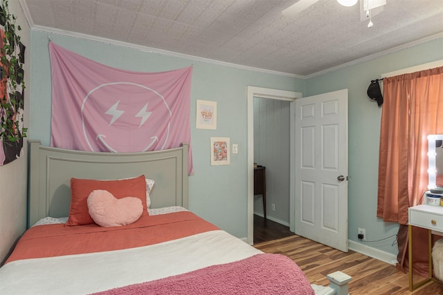 1147 Vz County Road 3417, Wills Point, TX 75169 - bedroom with wood finished floors and crown molding