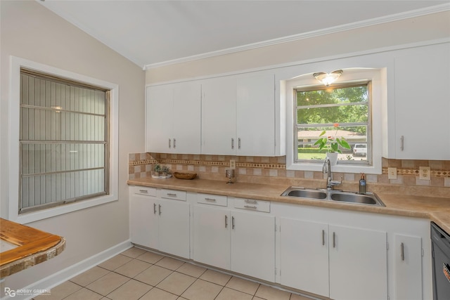 4102 Glen St, Bossier City, LA 71112 - kitchen featuring a sink, tasteful backsplash, light countertops, light tile patterned floors, and lofted ceiling