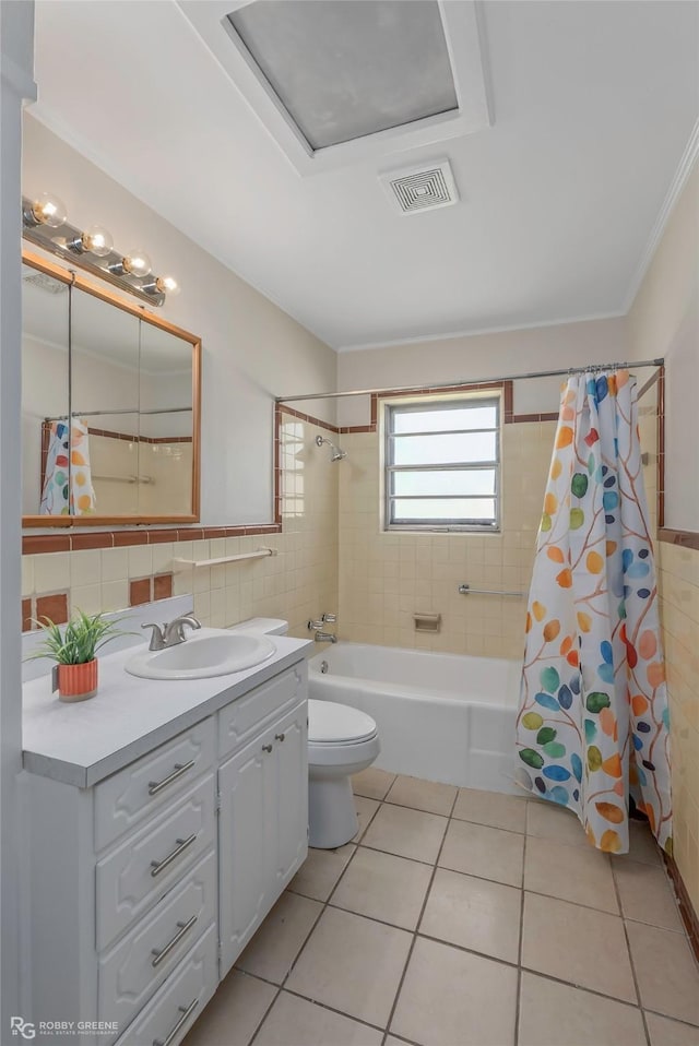 4102 Glen St, Bossier City, LA 71112 - bathroom with tile walls, vanity, toilet, shower / bath combination with curtain, and tile patterned floors
