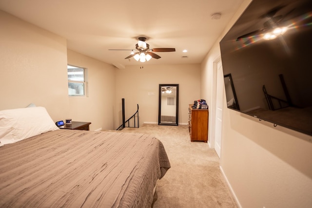 1343 Buster Chatham Rd, Waco, TX 76705 - bedroom with light colored carpet, baseboards, and ceiling fan