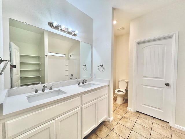 6940 Freeboard Way, Fort Worth, TX 76179 - full bath featuring toilet, tile patterned flooring, double vanity, and baseboards