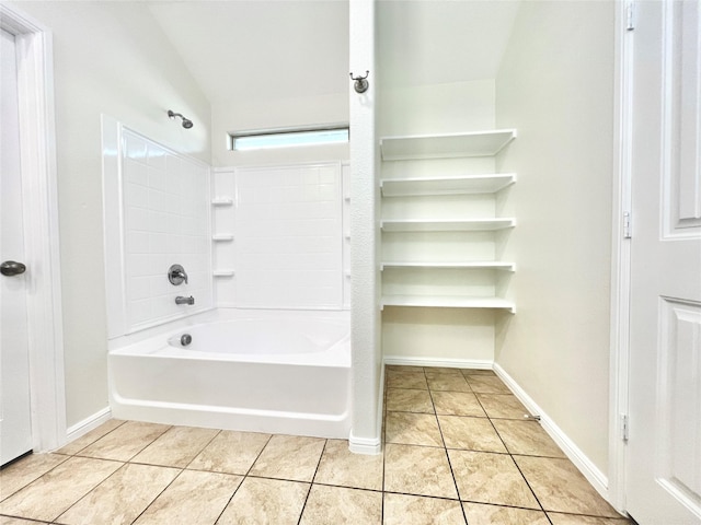 6940 Freeboard Way, Fort Worth, TX 76179 - bathroom featuring tile patterned flooring, shower / bathtub combination, baseboards, and lofted ceiling