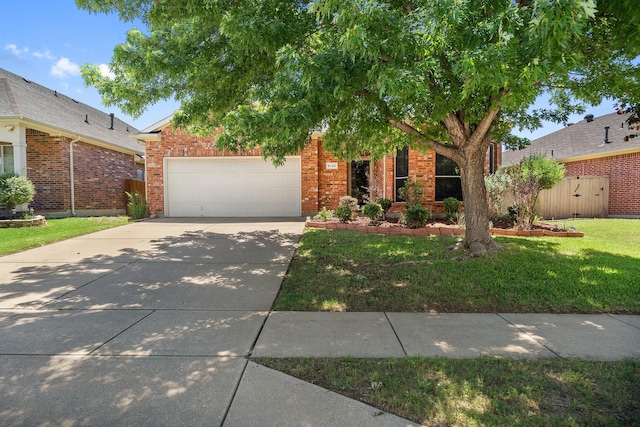 6132 Farrah Dr, Fort Worth, TX 76131 - view of front of home with an attached garage, brick siding, and concrete driveway