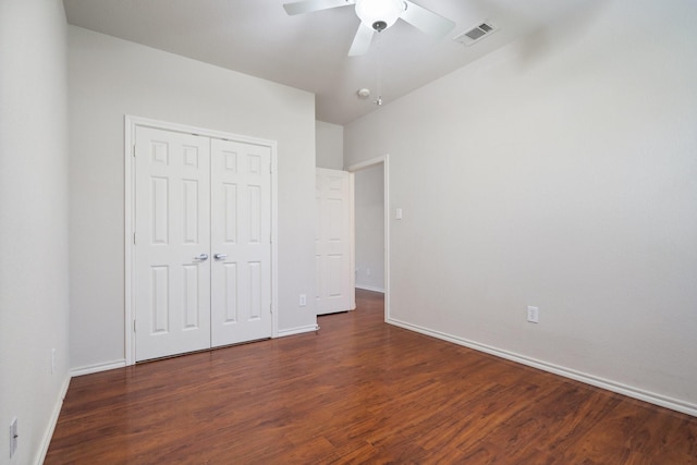 6132 Farrah Dr, Fort Worth, TX 76131 - unfurnished bedroom featuring dark wood-style flooring, baseboards, a closet, and a ceiling fan