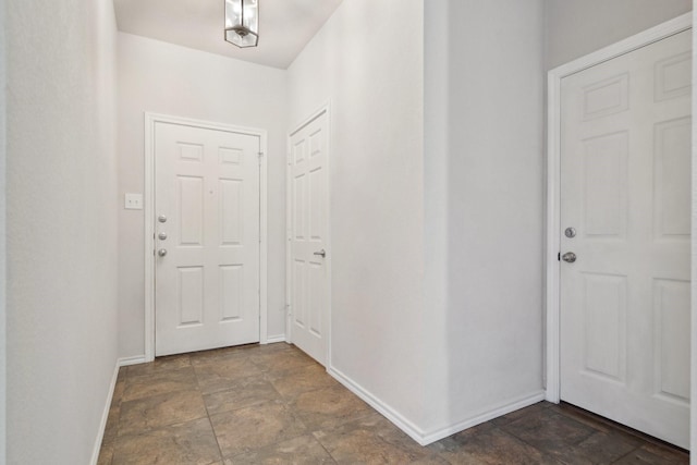6132 Farrah Dr, Fort Worth, TX 76131 - entryway featuring stone finish flooring and baseboards