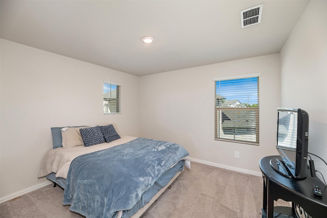 101 Goosewood Dr, Mckinney, TX 75071 - bedroom featuring carpet flooring, multiple windows, and baseboards