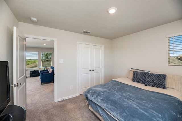 101 Goosewood Dr, Mckinney, TX 75071 - bedroom with carpet flooring, a closet, baseboards, and recessed lighting