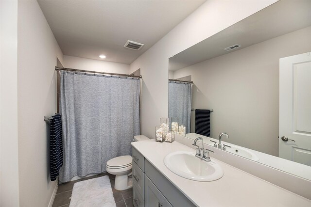 101 Goosewood Dr, Mckinney, TX 75071 - bathroom with vanity, toilet, tile patterned flooring, a shower with shower curtain, and recessed lighting