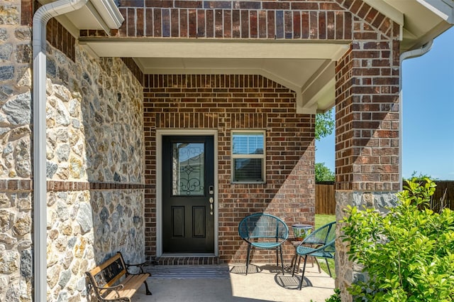 101 Goosewood Dr, Mckinney, TX 75071 - doorway to property featuring brick siding