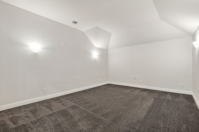906 Overton Ave, Celina, TX 75009 - bonus room featuring vaulted ceiling, dark carpet, and baseboards