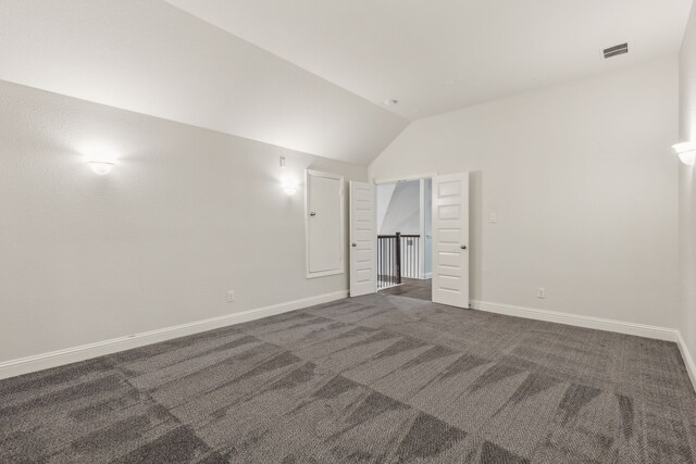 906 Overton Ave, Celina, TX 75009 - unfurnished bedroom with vaulted ceiling, carpet, and baseboards