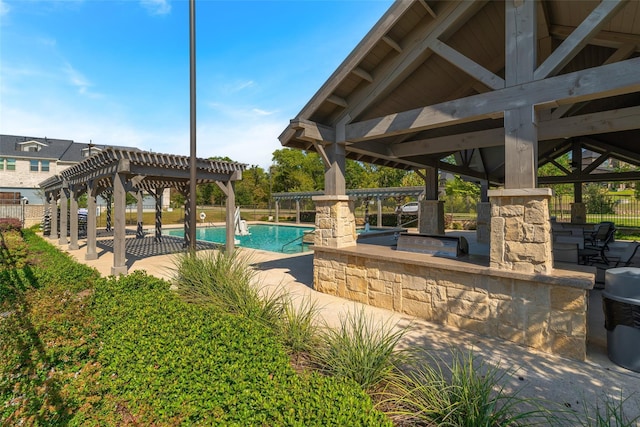 317 Mcconathy Way, Flower Mound, TX 75028 - community pool with a pergola, a gazebo, and a patio area