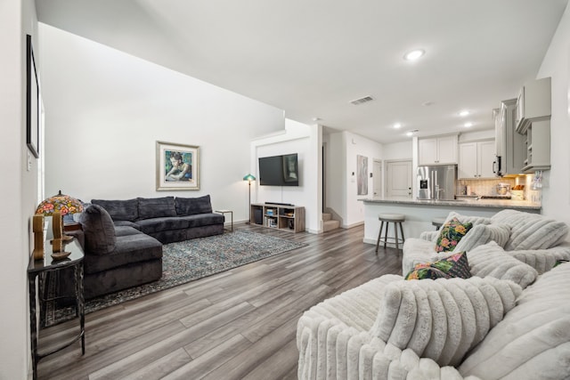 317 Mcconathy Way, Flower Mound, TX 75028 - living room with light wood-style floors, recessed lighting, and baseboards