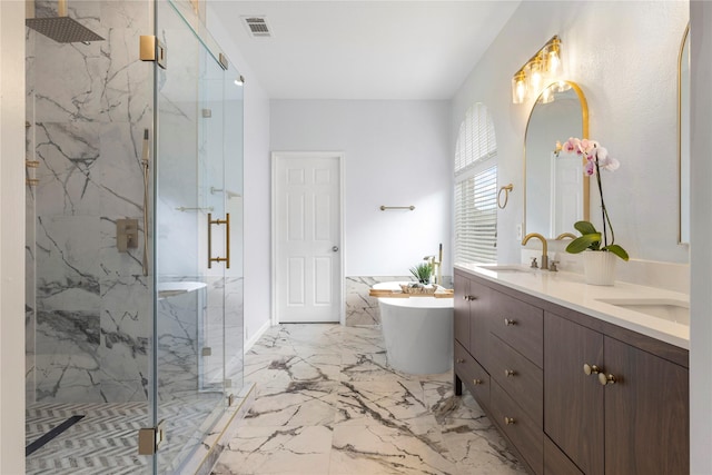 2204 Trinity Ln, Mckinney, TX 75072 - bathroom featuring a marble finish shower, marble tiled flooring, double vanity, and a freestanding tub