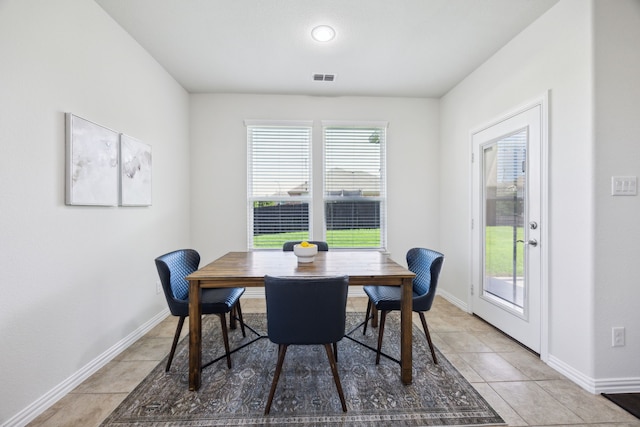1901 Brahorn Ln, Fort Worth, TX 76131 - dining space with baseboards and light tile patterned flooring