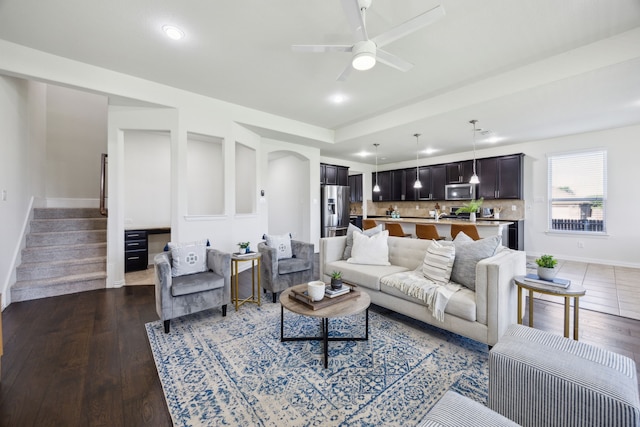 1901 Brahorn Ln, Fort Worth, TX 76131 - living area featuring a ceiling fan, baseboards, stairs, wood finished floors, and recessed lighting