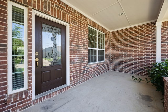 1901 Brahorn Ln, Fort Worth, TX 76131 - property entrance featuring a porch and brick siding