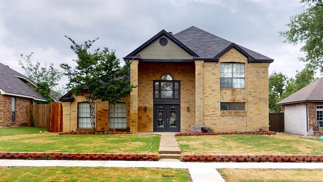 4917 Meadow Vista Pl, Garland, TX 75043 - traditional-style house featuring french doors and brick siding