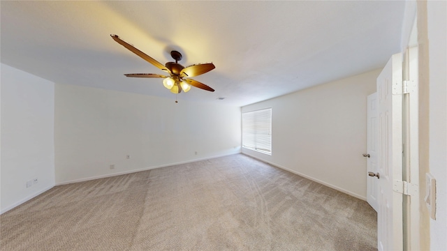 4917 Meadow Vista Pl, Garland, TX 75043 - unfurnished room with light carpet, a ceiling fan, and baseboards