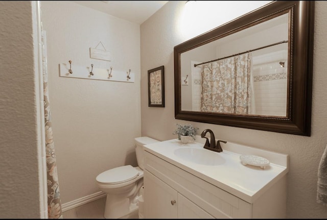 6304 Kary Lynn Dr S, Watauga, TX 76148 - bathroom featuring vanity, toilet, and a shower with shower curtain