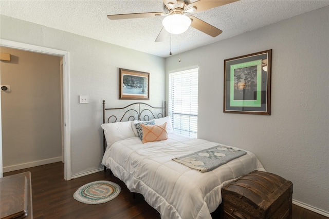 6304 Kary Lynn Dr S, Watauga, TX 76148 - bedroom with wood finished floors, a textured ceiling, baseboards, and ceiling fan