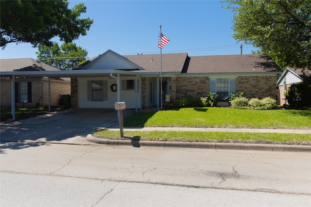6304 Kary Lynn Dr S, Watauga, TX 76148 - single story home featuring brick siding, a front lawn, an attached carport, and driveway