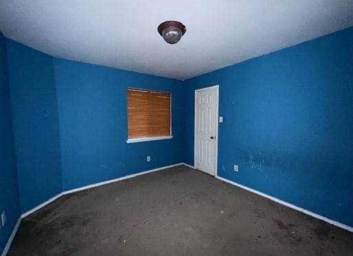 712 Mistymoor Ln, Fort Worth, TX 76052 - carpeted spare room with baseboards