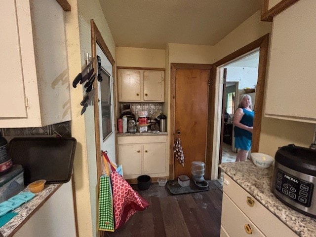 4132 Fm 546, Princeton, TX 75407 - kitchen with wood finished floors and white cabinets