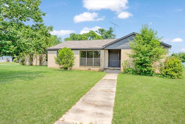 104 Mackinnon, Mount Pleasant, TX 75455 - single story home featuring brick siding and a front lawn