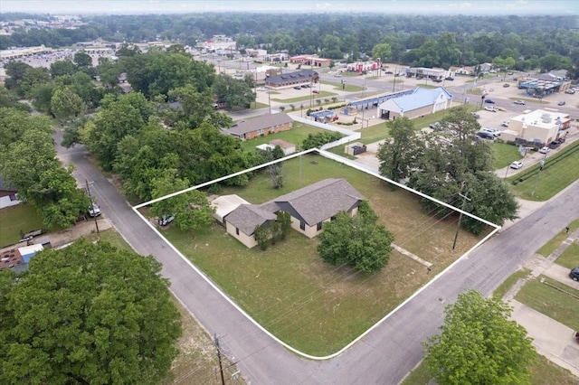 104 Mackinnon, Mount Pleasant, TX 75455 - aerial overview of property's location with property boundaries highlighted