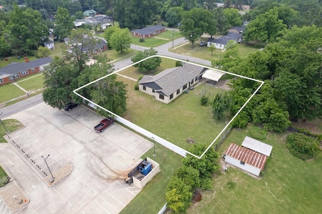 104 Mackinnon, Mount Pleasant, TX 75455 - aerial overview of property's location featuring property boundaries highlighted