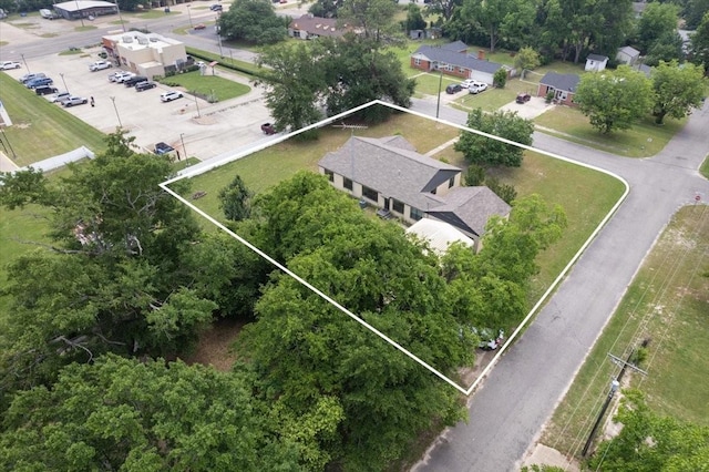 104 Mackinnon, Mount Pleasant, TX 75455 - aerial view of property and surrounding area with property boundaries highlighted