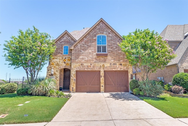 131 Lavaca Dr, Irving, TX 75039 - view of front of property with brick siding, driveway, stone siding, and an attached garage